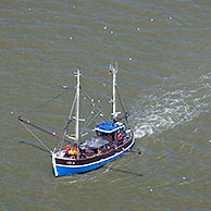 Shrimp boat fishing in the Wadden sea, North Frisia, Germany