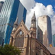 Skyscrapers and the St Stephen's Old Catholic Cathedral / St. Stephen's Chapel in the center of Brisbane, capital city of Queensland, Australia