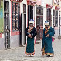 Two Tibetan women wearing traditional dress in Maduo / Madoi county in southeast-central Qinghai province, China