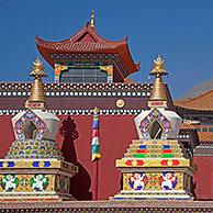 The Sengze Gyanak Mani wall, the longest wall of prayer wheels in the world, along the Sichuan-Tibet Highway between Yushu and Xiewu, Qinghai province, China