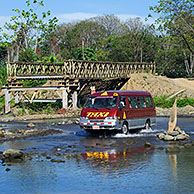 Taxi crossing river in Costa Rica