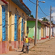 Colonial street with pastel coloured houses in the center of Trinidad, Cuba