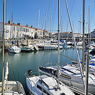 Sailing boats in the port at Saint-Martin-de-Ré on the island Ile de Ré, Charente-Maritime, France