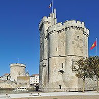 Sailing ship and the medieval towers tour de la Chaîne and tour Saint-Nicolas in the old harbour / Vieux-Port at La Rochelle, Charente-Maritime, France