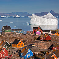 Uummannaq village with colourful houses and icebergs in the fjord, North-Greenland, Greenland
