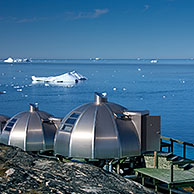 Metal igloo cabins of Hotel Arctic looking over the Ice Fjord at Ilulissat, Disko-Bay, West-Greenland, Greenland
