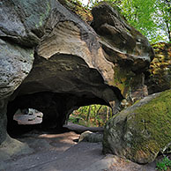 The Hohllay cave showing grooves and circles in the sandstone rock from carving millstones, Berdorf, Little Switzerland  / Mullerthal, Grand Duchy of Luxembourg
